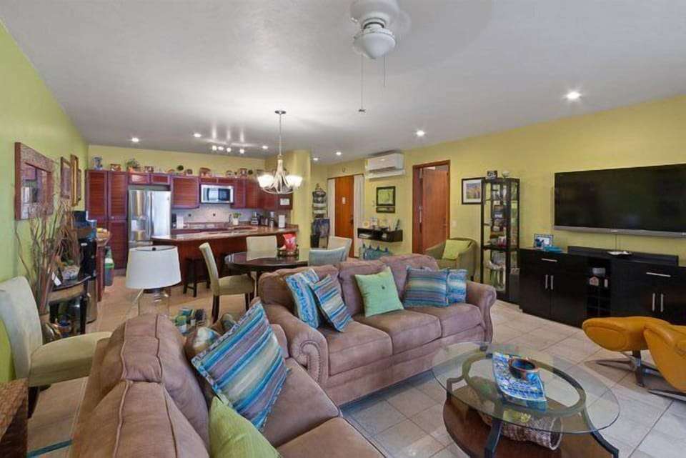 Comfortable living room with 42 inch TV and entertainment center