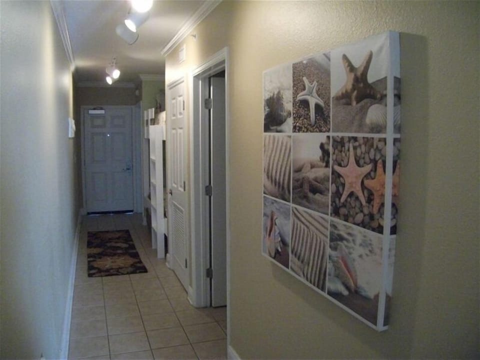View of hallway with bunk area, laundry, and second full bath for your comfort!