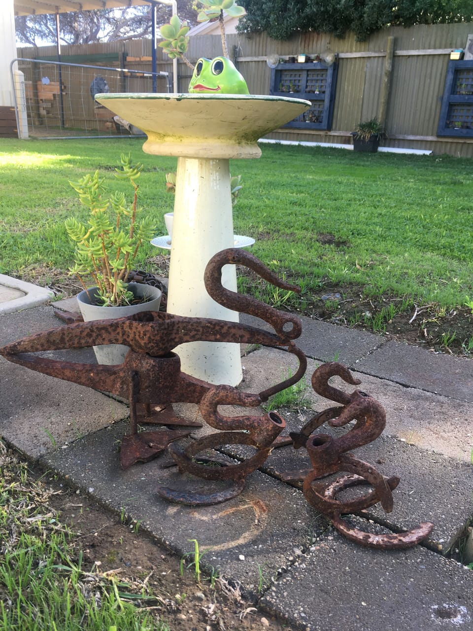 Metal garden art by host