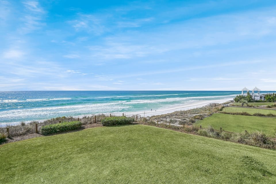 Adagio C205 view of gulf! - Your Friend at the Beach's Adagio C205 has access to the grassy area overlooking the Gulf. Perfect for the kids to play on after a day on the beach.