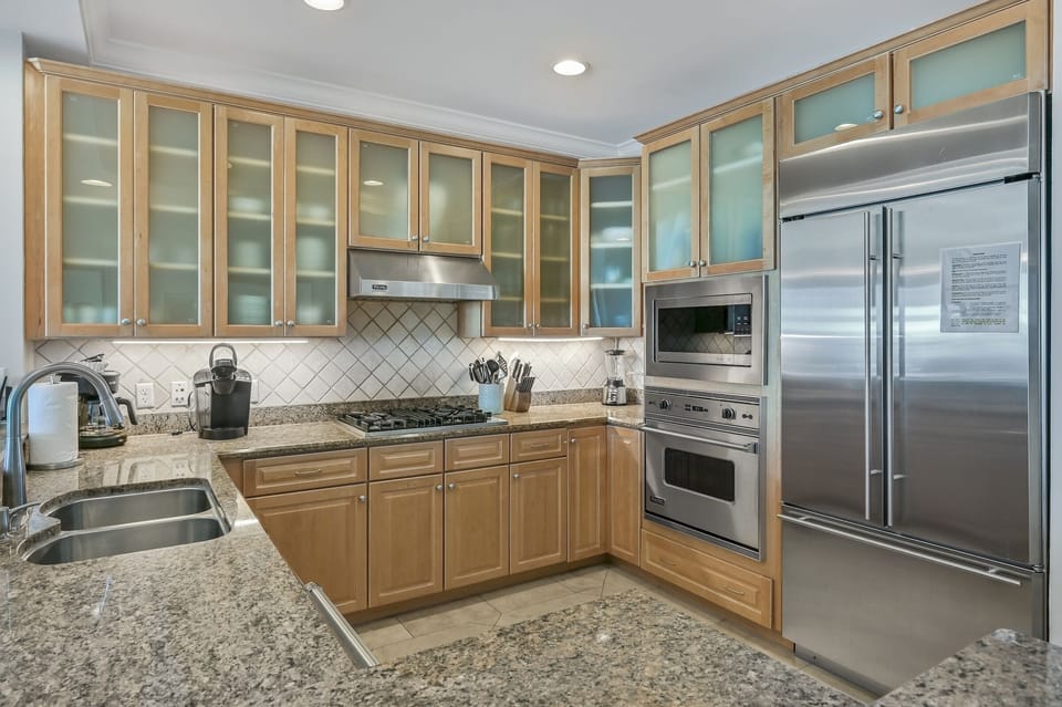 Spacious kitchen with stand alone icemaker! - Adagio C205 has large built-in refrigerator with everything you need for your family and friend's best beach vacation on 30A! Crock pot, air fryer, keurig, regular coffee pot, plenty of dishware, bakeware, serving ware - and of course a wine bottle open!
