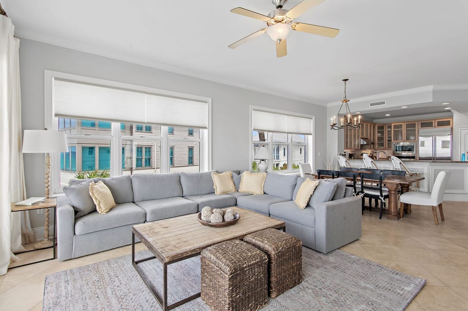Living Room - Updated in 2026 with a new sectional, the living room is bright, spacious, and perfect for relaxing.
