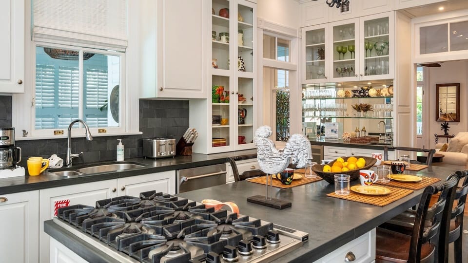 The fully equipped kitchen has premium appliances and all of the tools needed to prepare a meal at home...