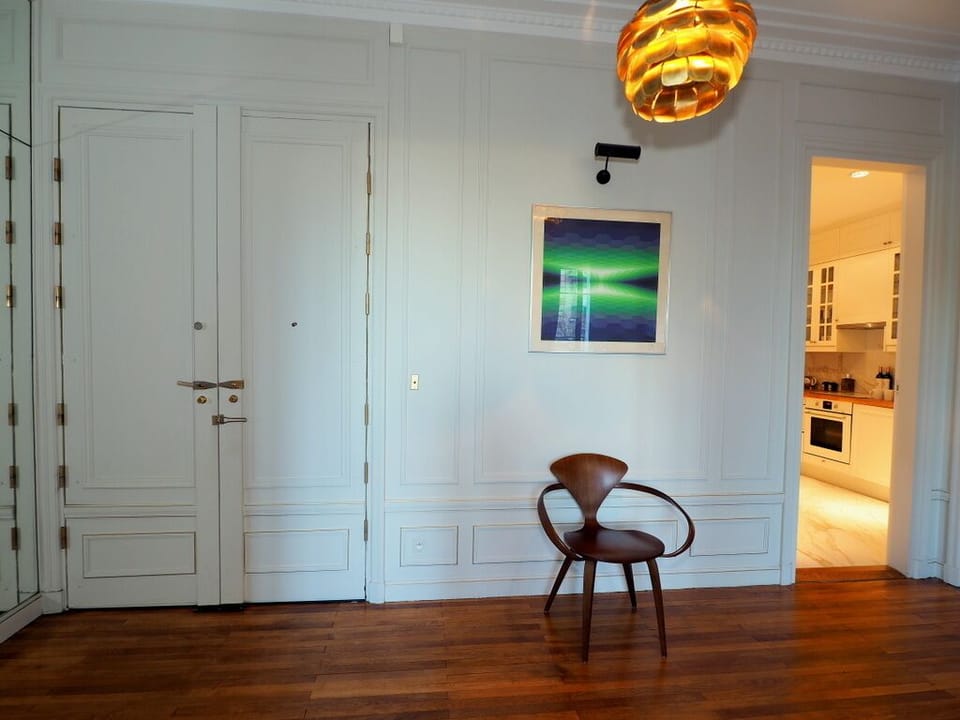 Entry Hall with Cherner Armchair, Vasarely picture and 70's light