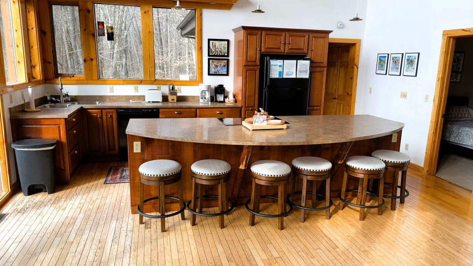 Your spacious kitchen island becomes the heart of your getaway, perfect for morning coffee or sharing meals with loved ones.