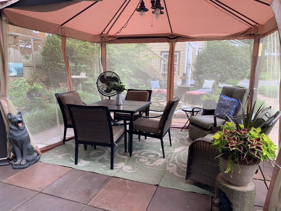 Seating and dining under the gazebo in the courtyard 