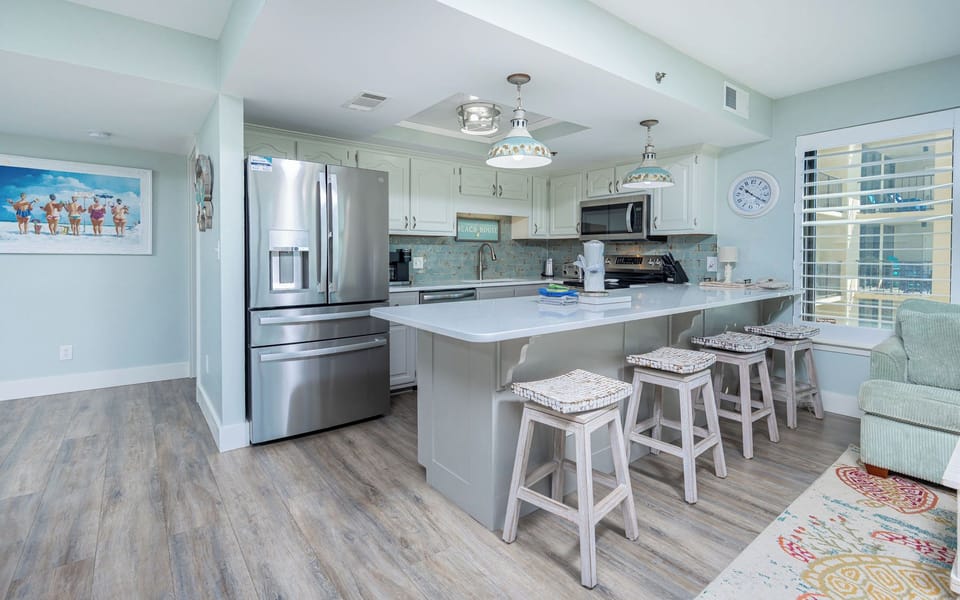 Embrace your inner chef as you whip up family favorites in this inviting kitchen, complete with stainless appliances