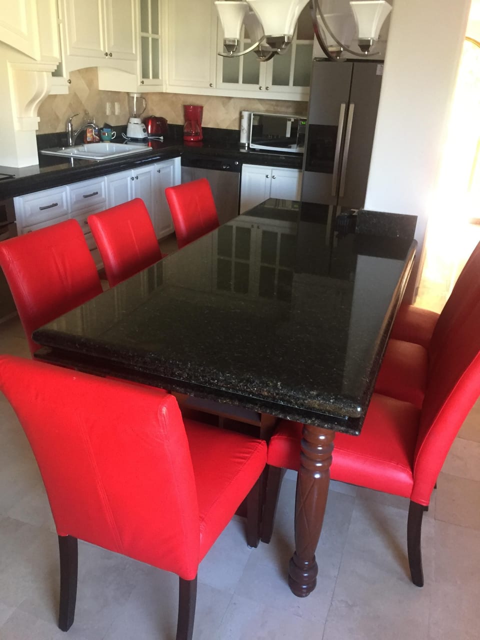 Granite dining room table with seating  for seven