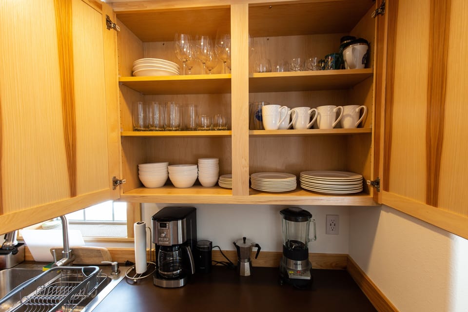 Lots of dinnerware and glassware to meet your needs.