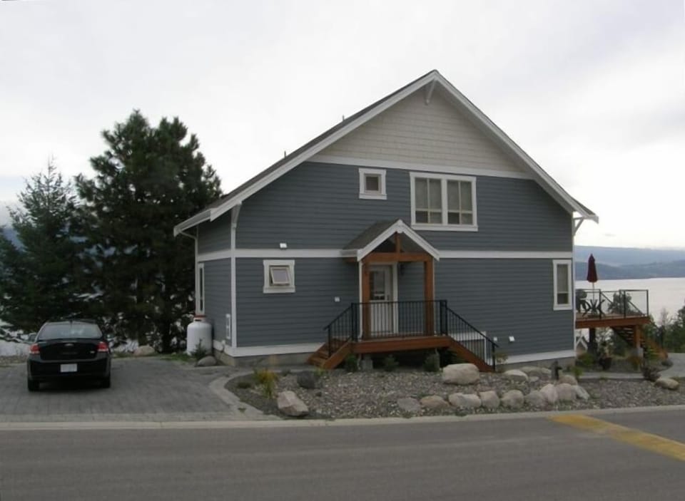 Cottage # 55, La Casa Resort; main entry side with parking area.
