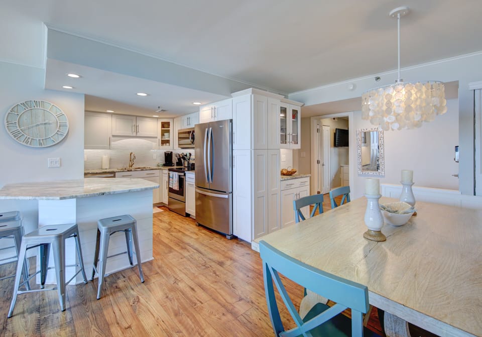 Great kitchen, island and dining room arrangement for family gatherings!
