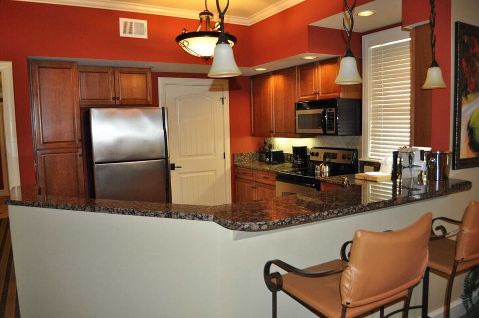 Fully Equipped Kitchen with Adjacent Laundry