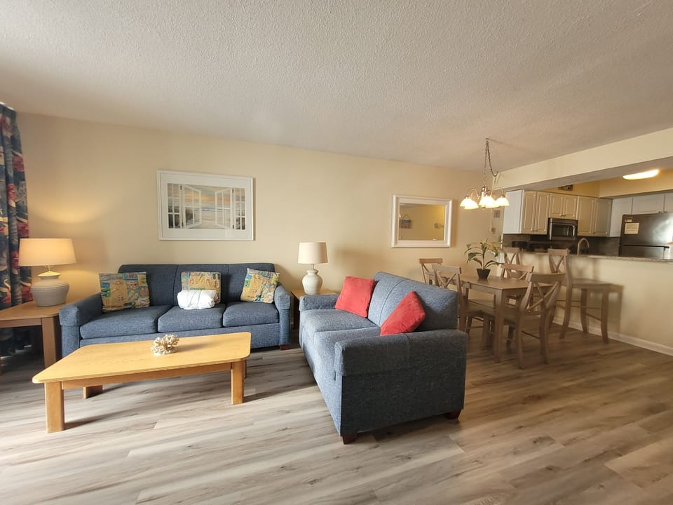 Living area with queen size sleeper sofa.