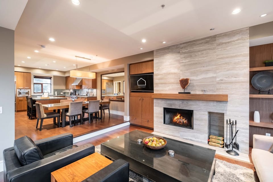 Living area: Wood-burning fireplace, balcony access