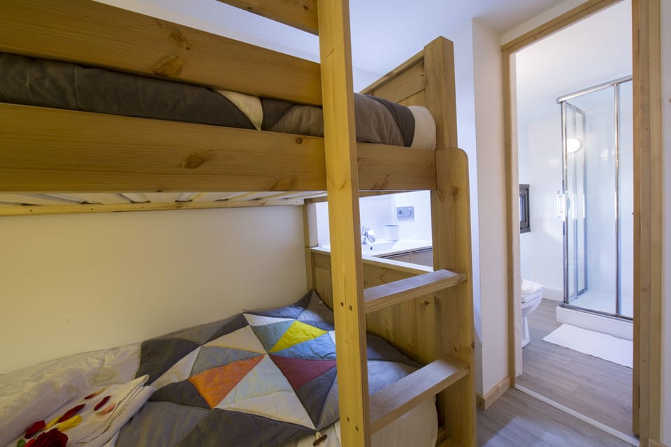 View of bedroom and  bathroom
