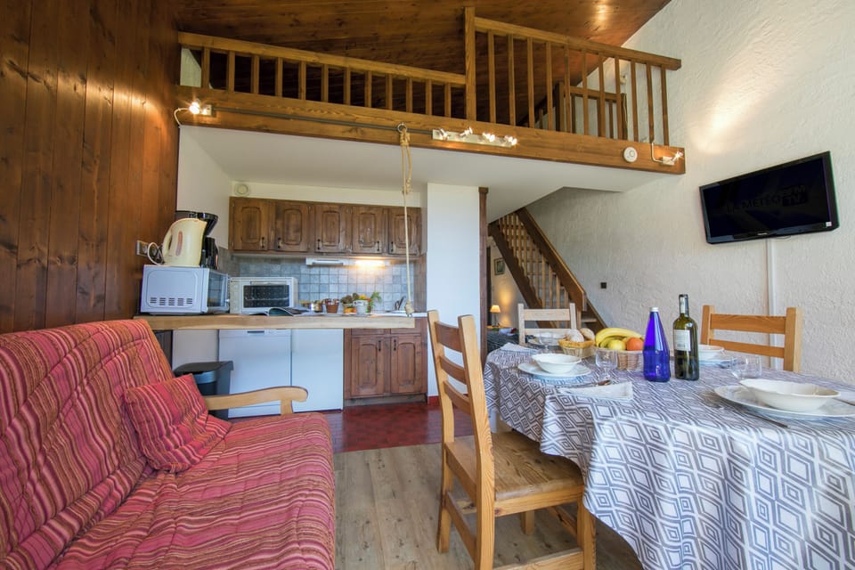 Open plan living space with a mezzanine