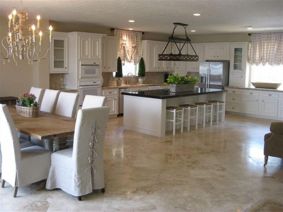 Large kitchen with sofa seating area and beautiful views of Lake Conroe.