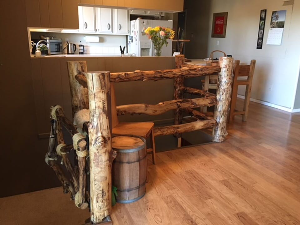 Glimpse of kitchen and stairs to hot tub from the dining area