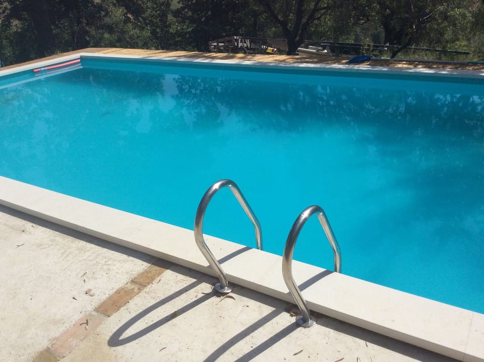 Private an secluded pool with plenty of sunbathing room!