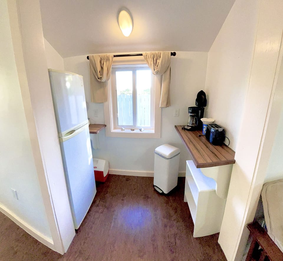Full kitchen; fridge, gas stove/oven, microwave, toaster, etc. and dining for 2.