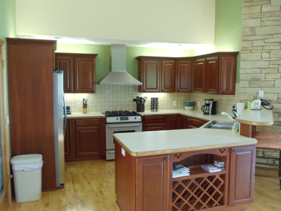 Kitchen is fully equipped - cabinets in deep cherry