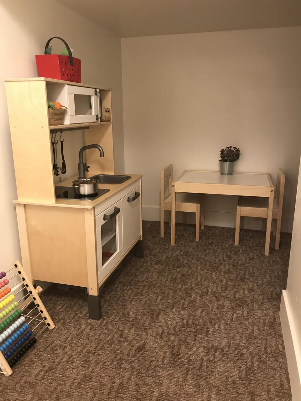 Kids play area under stairs