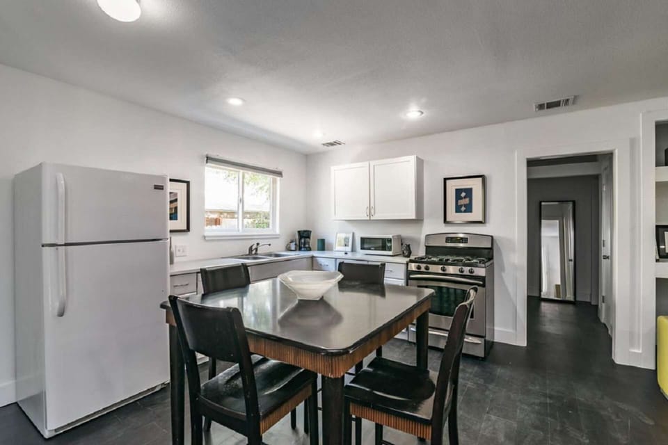 Fully stocked kitchen and dining area