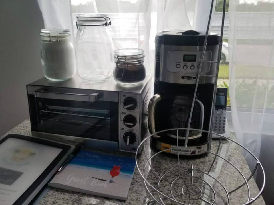 coffee maker, grill, house manual and guest book