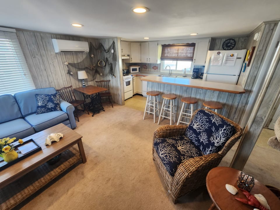 RELAX IN COMFORTABLE LIVING ROOM, ENTER VIA SCREENED PORCH



