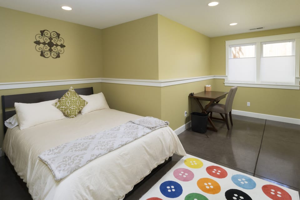 Lower Level - Queen Bed and Writing Desk off the Bonus/TV Room. 