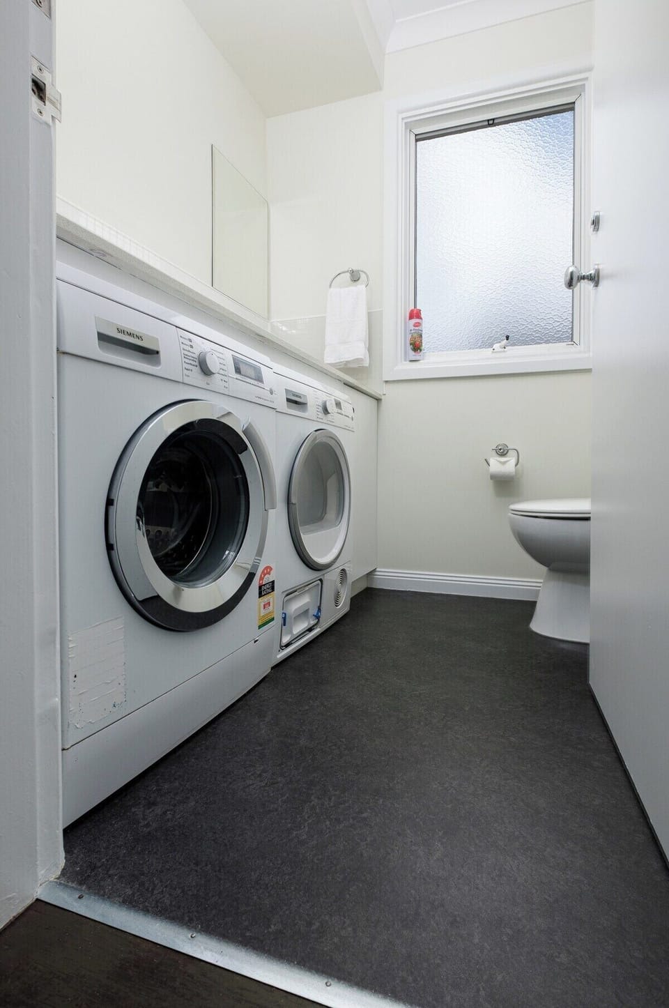 Front loading washing machine & dryer.