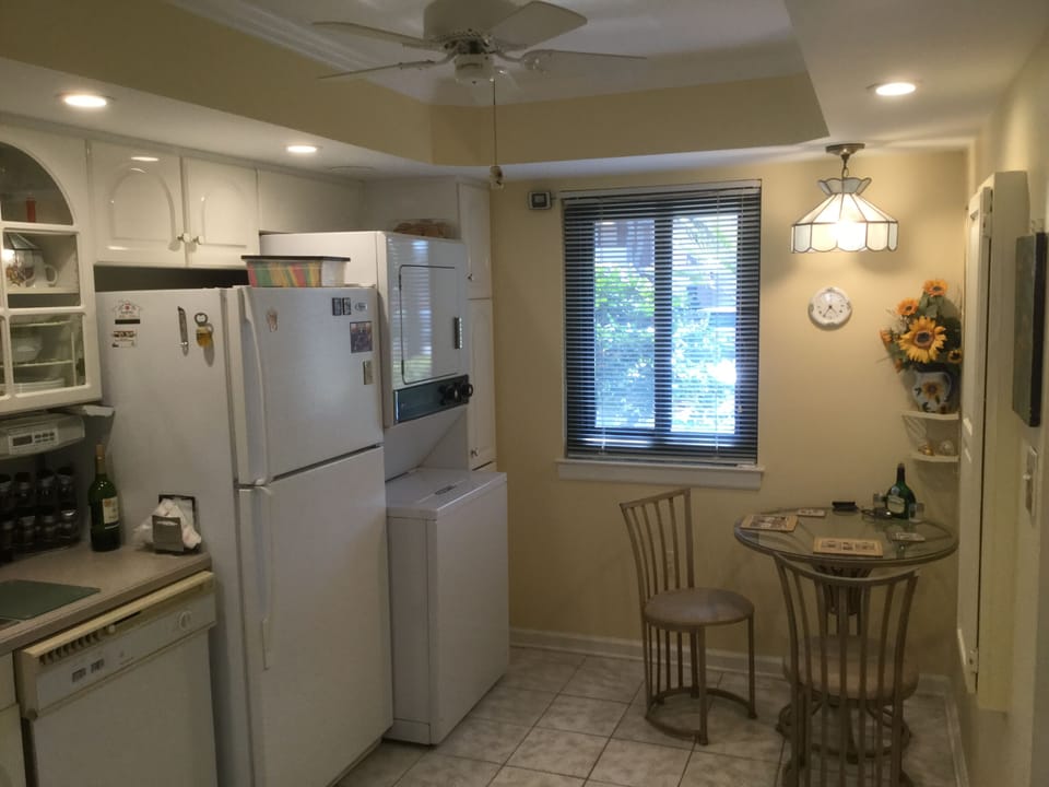 Kitchen with breakfast nook and washer and dryer and dishwasher
