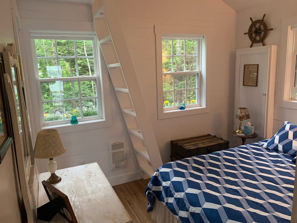 2nd br with small loft and child size floor mattress in loft. Queen size bed