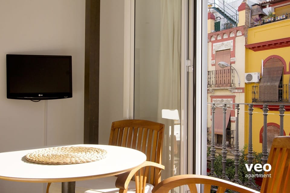 The table is next to the window.