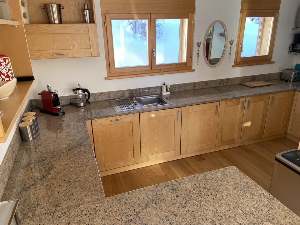 Fully equipped kitchen with all appliances including Nespresso coffee machine