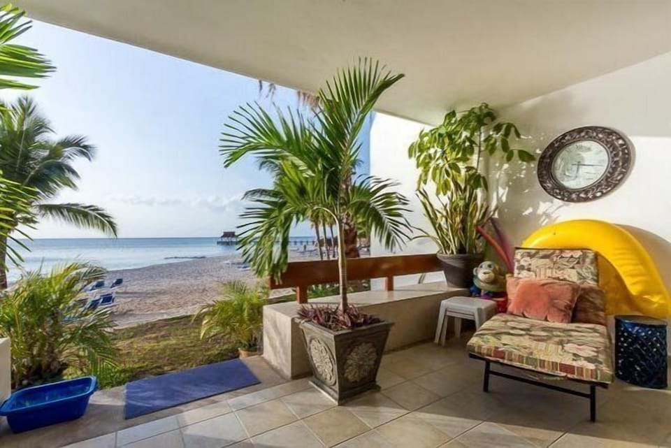 The wrap around terrace goes straight out to the beach