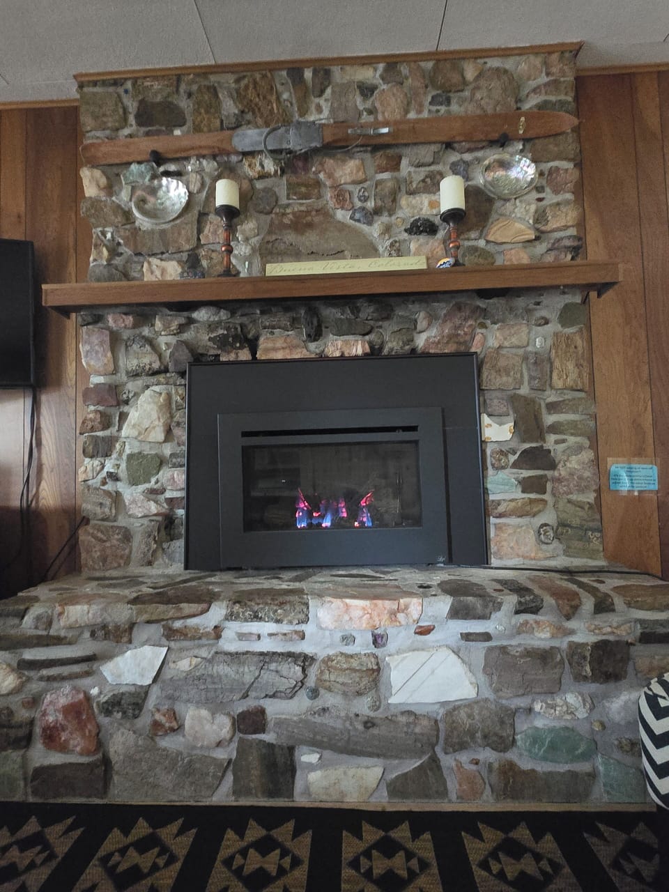 Very unique fireplace hearth.  Gas fireplace.  Main source of heat for cabin.