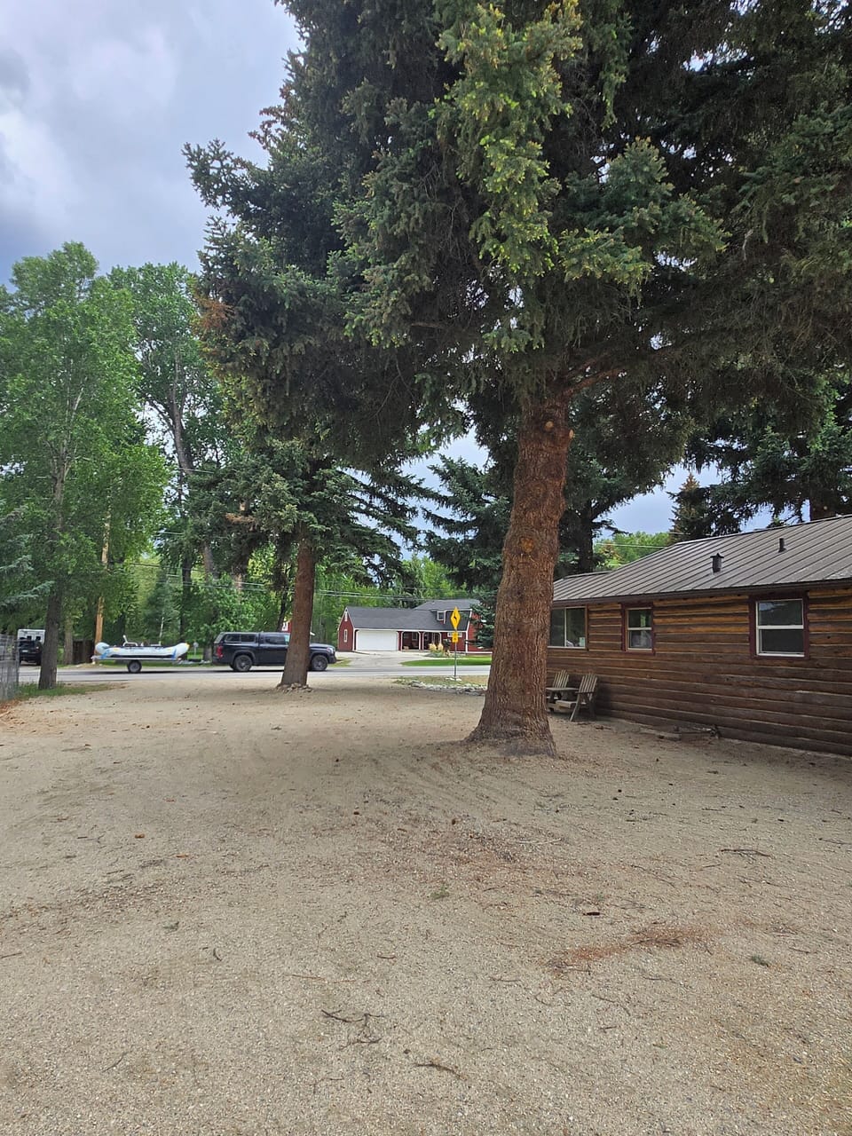 Driveway looking towards front of cabin & main street.  Lots of room for parking