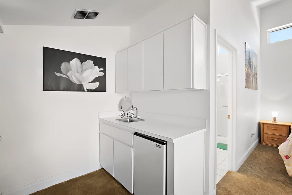Master Bedroom Kitchenette with fridge.