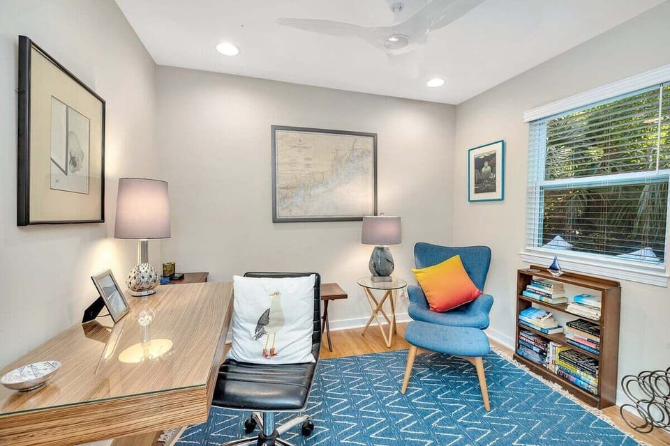 Office space with desk and lounge chair