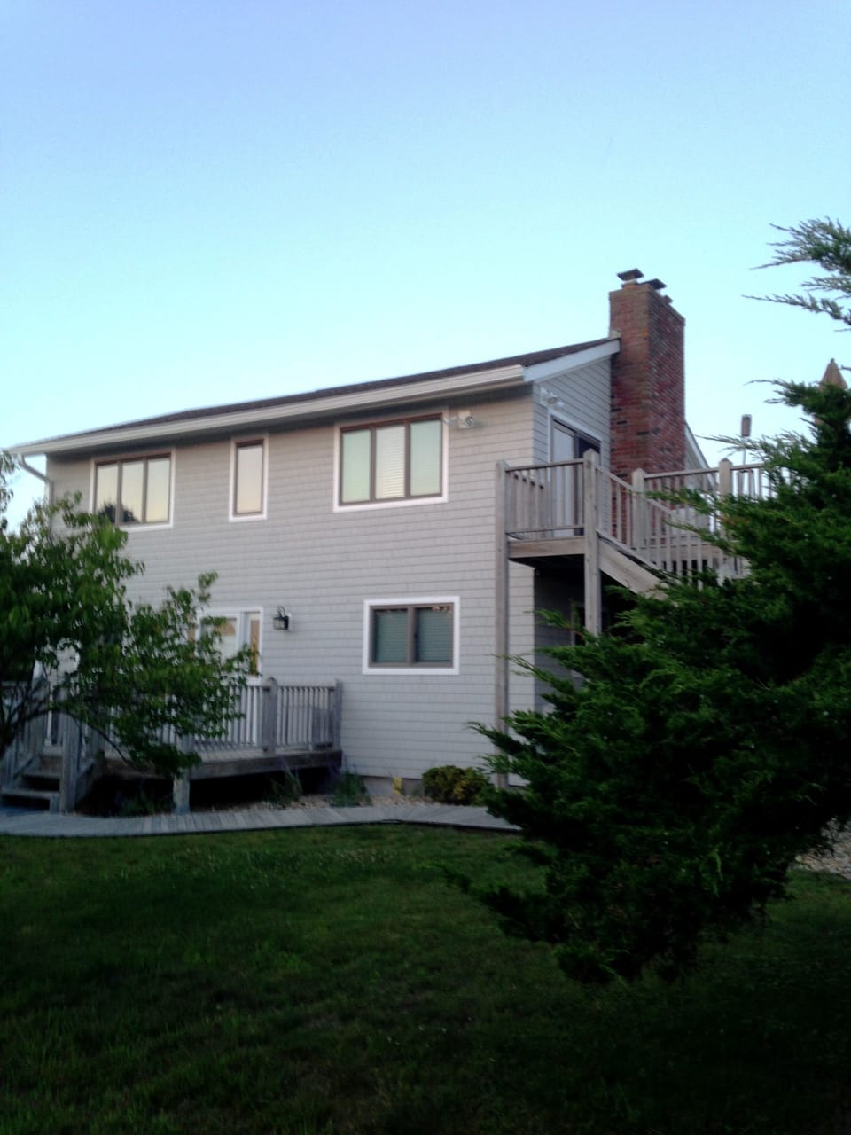 New Cedars Shingles along with new windows and gutters.