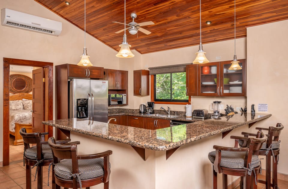 large kitchen with eating bar