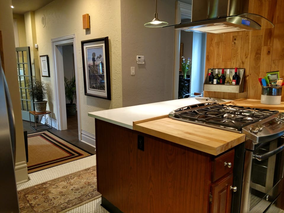 View of wine bar through kitchen