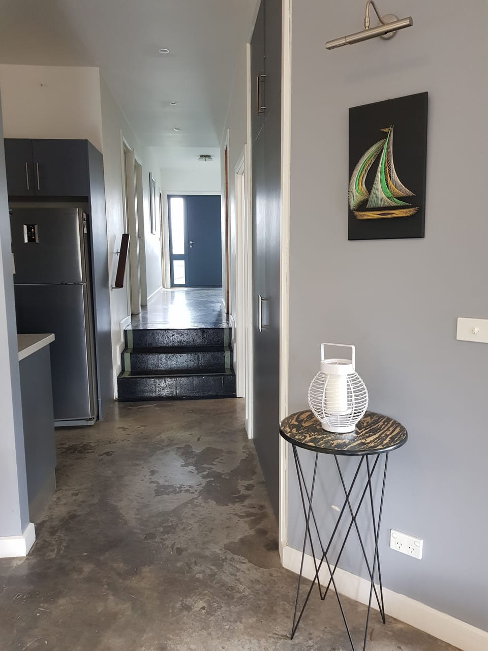 view to frony door from kitchen