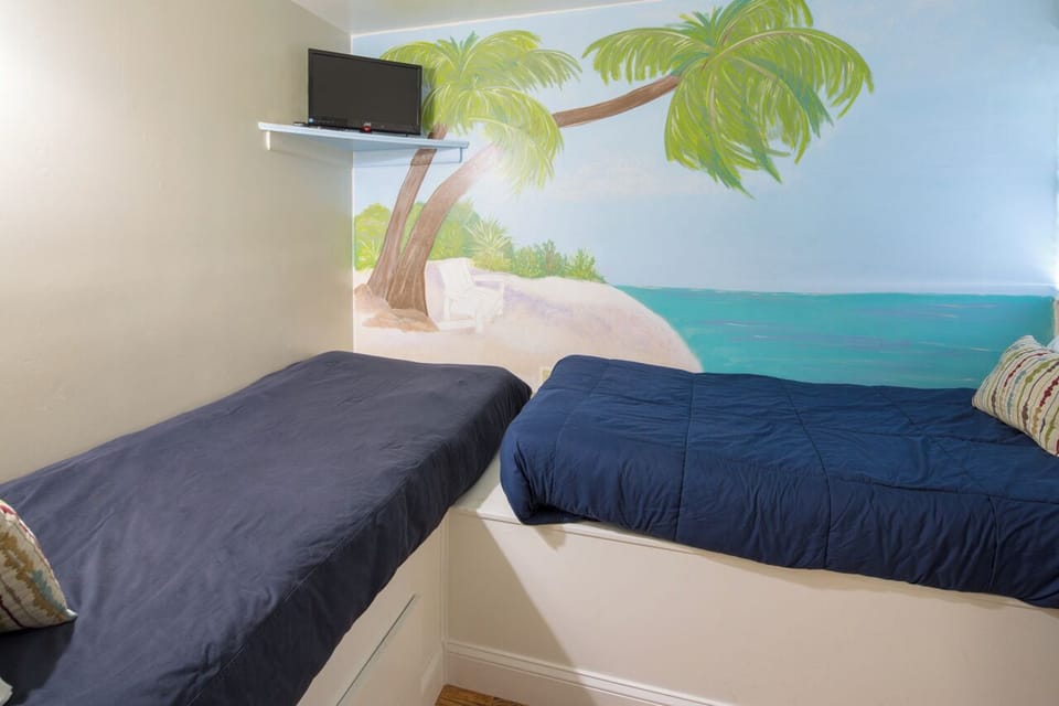 Third Bedroom - “The Crow’s Nest” - The smaller third bedroom known as the “Crow’s Nest” is a cozy place for the children to sleep and make their own!