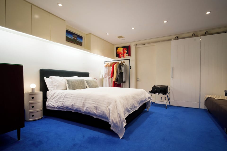 Luxury bed in spacious bedroom