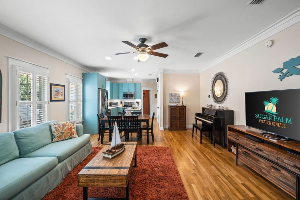 Comfortable, open floor plan with original wood floors.