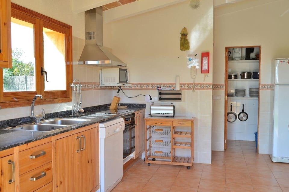 The villa has a large kitchen and it´s equipped with all appliances