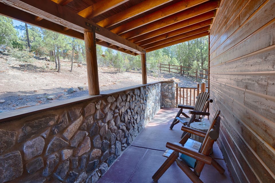 Back porch seating.  Back fully fenced in.  Grill on back porch outside kitchen