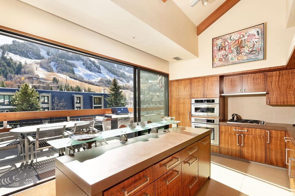Kitchen with Sliding Doors to Balcony & Aspen Mountain Views